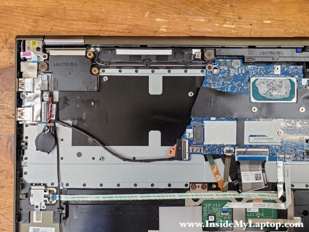The keyboard in Lenovo Yoga 7 15ITL5 laptop is riveted to the top case assembly.