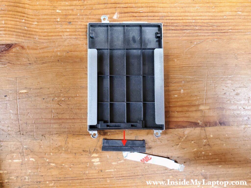 Transfer the SATA cable and mounting brackets to the new drive.