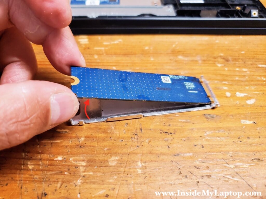 Carefully separate the SSD from the heatsink.