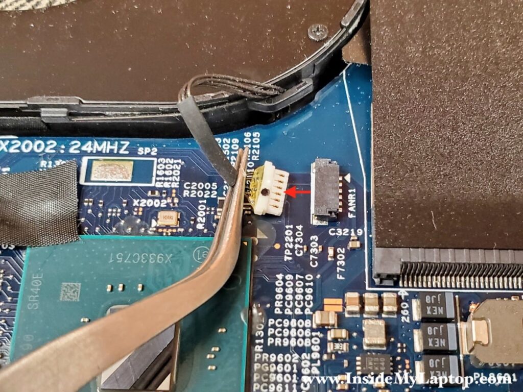 Disconnect the fan cable from the motherboard.